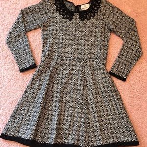 Hanna Andersson dress. Size 130 (US size 8). Black appliqué.